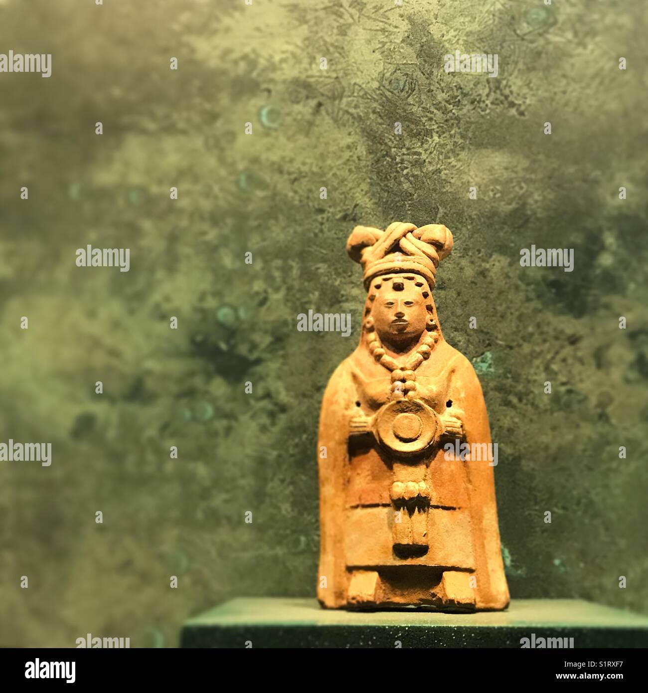 A miniature sculpture of a Mayan is displayed in Museo Nacional de Antropologia in Mexico City, Mexico Stock Photo