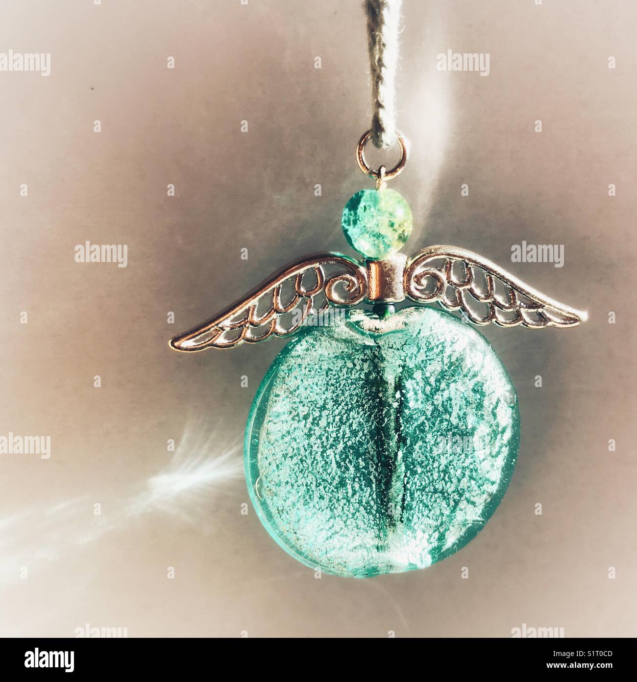 Handmade Christmas ornament, angel,  made from glass beads and metal wings Stock Photo