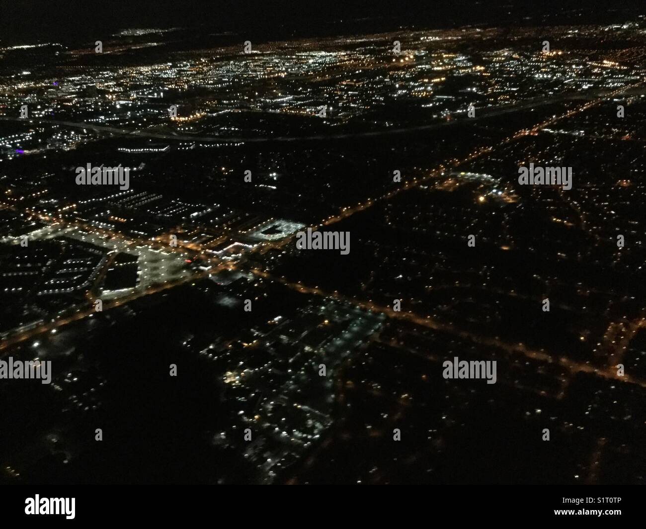 Aerial view of city lights at night. - Smartphone Captured Stock Image