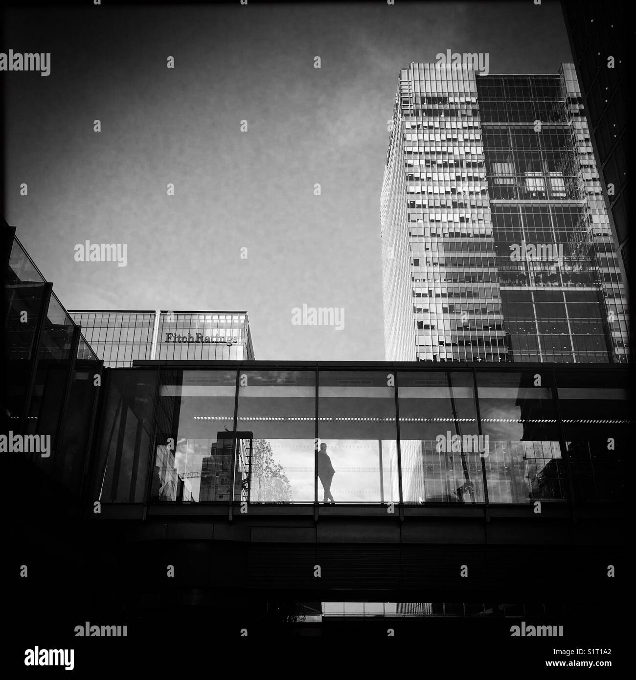 Man on walkway Canary Wharf - Smartphone Captured Stock Image