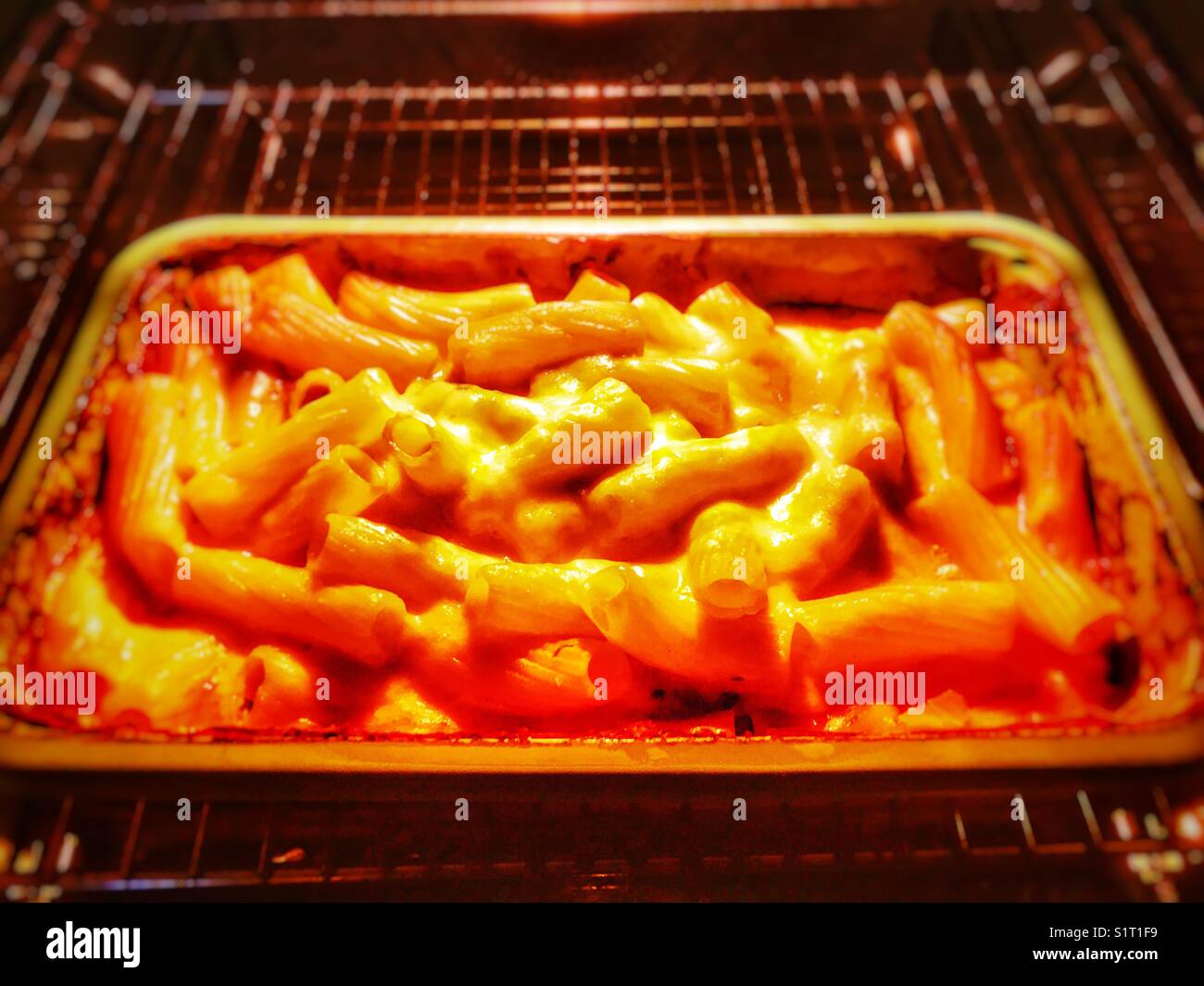 Cheese pasta melt in oven - Smartphone Captured Stock Image