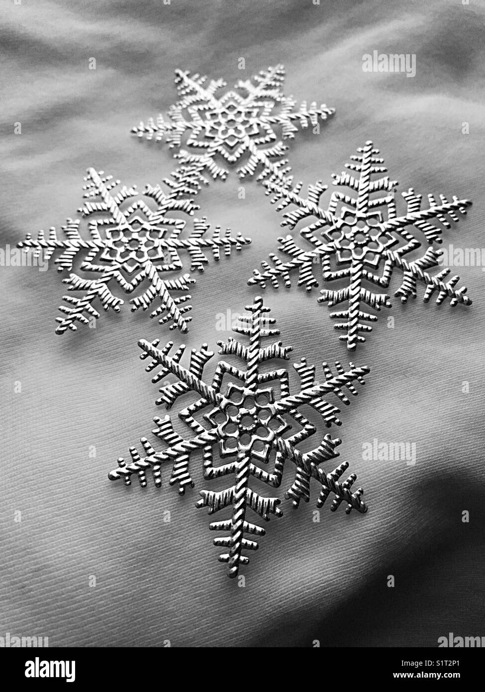 Black and white metal snowflake ornaments Stock Photo