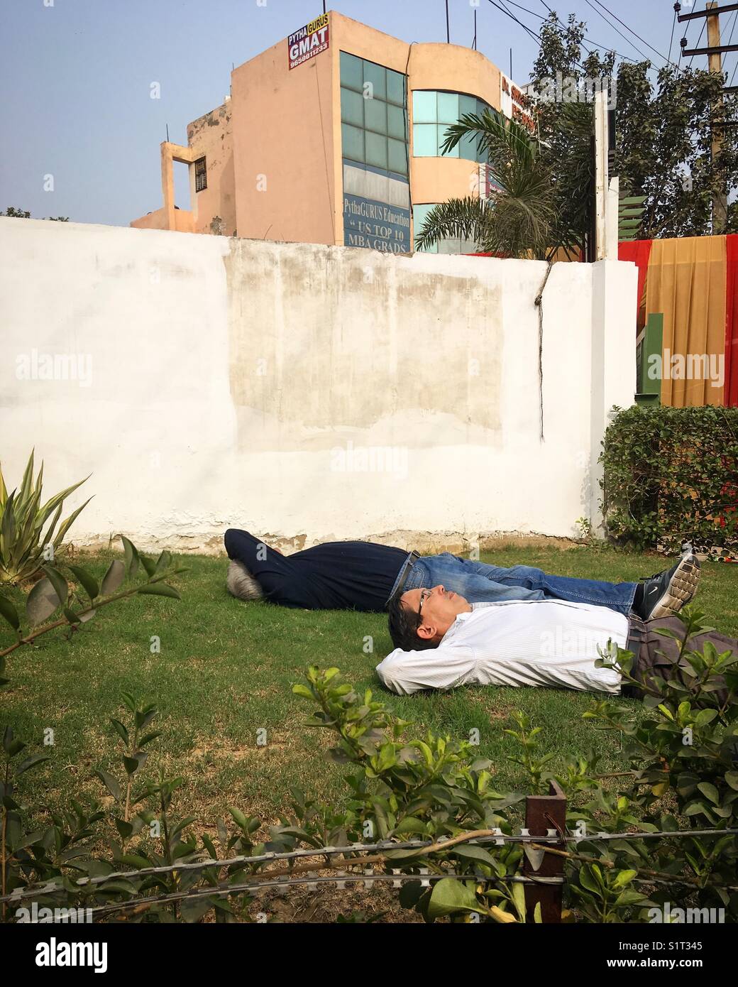 People enjoying sunbath in Gurgaon India Stock Photo