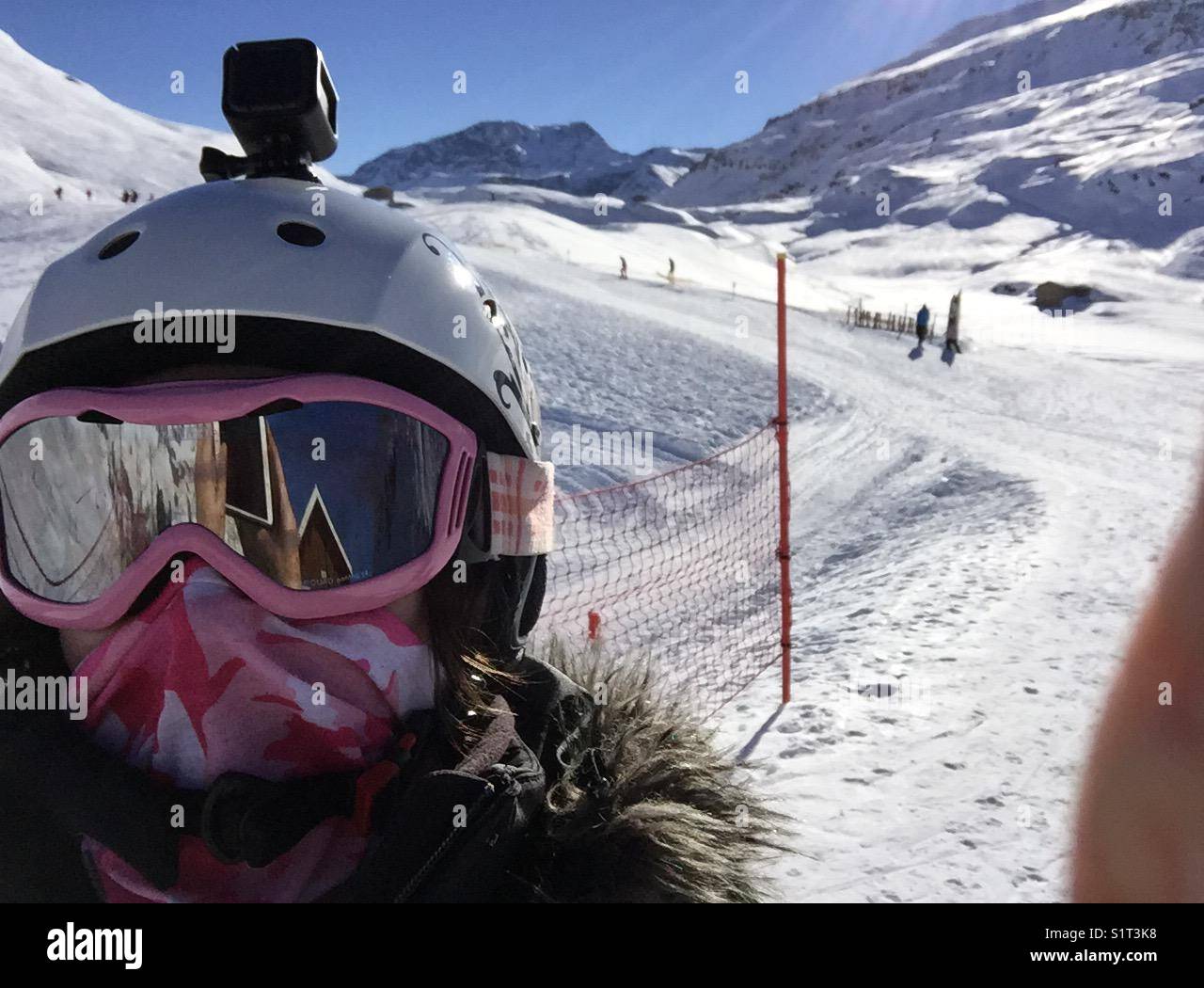 Skiing in mountains with head cam on helmet Stock Photo