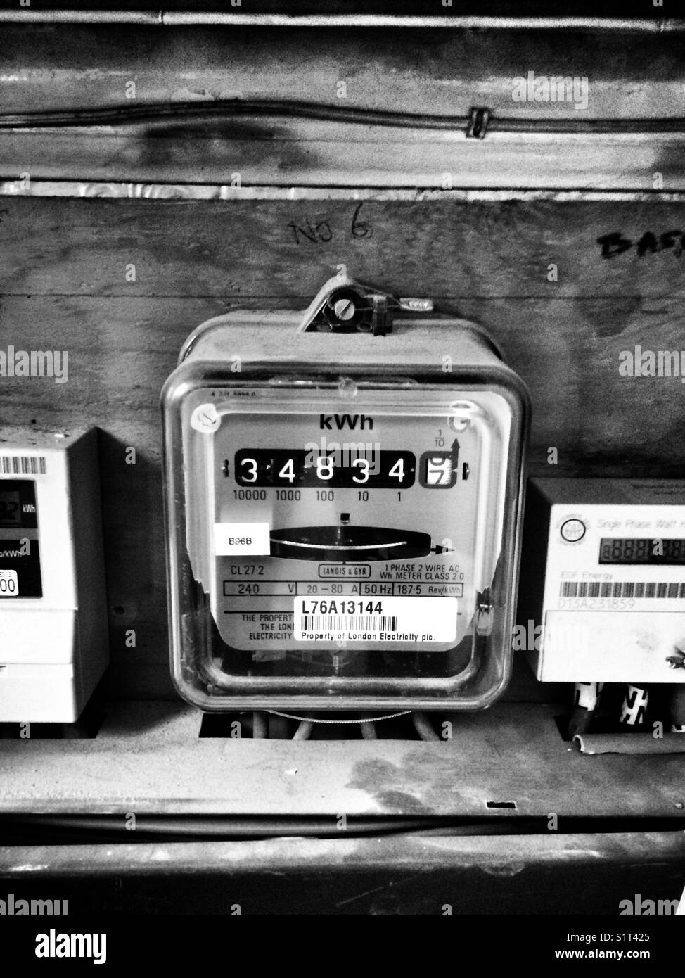 Electricity meters in flat complex Stock Photo