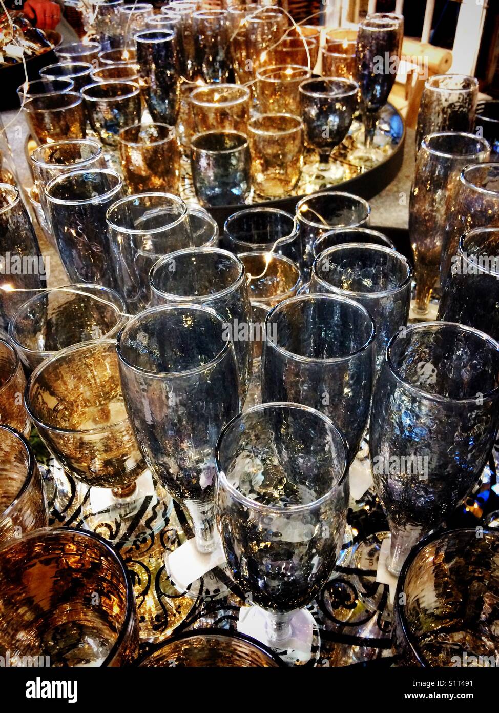 Solver & gold festive glasses with Christmas lights - Smartphone Captured Stock Image