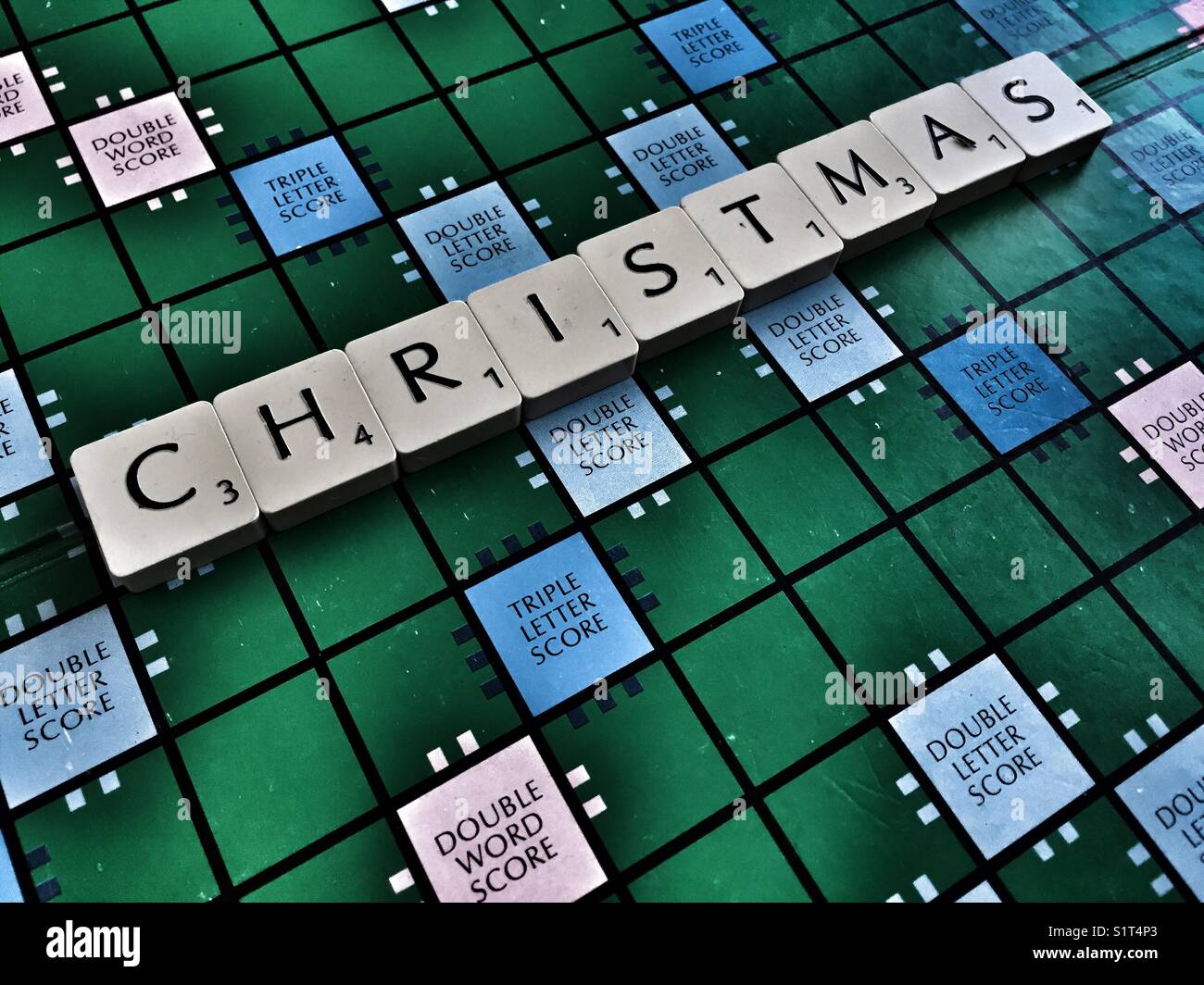 The word: Christmas written with scrabble tiles - Smartphone Captured Stock Image