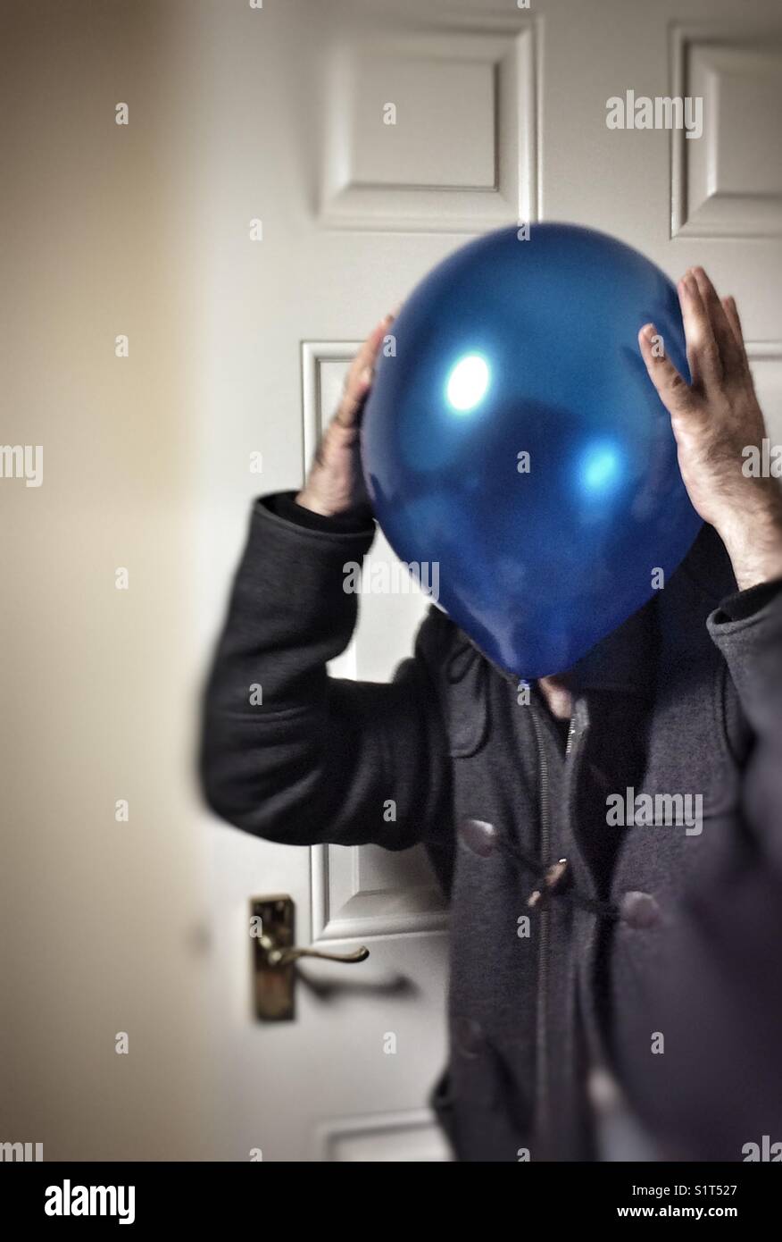 Mr Blue/baloon headache walking into the room - Smartphone Captured Stock Image