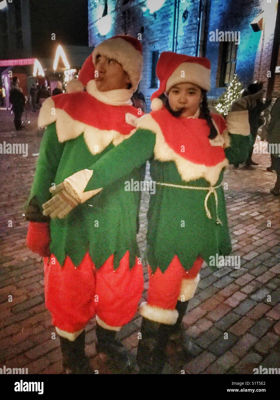 Christmas elves posing Stock Photo Alamy