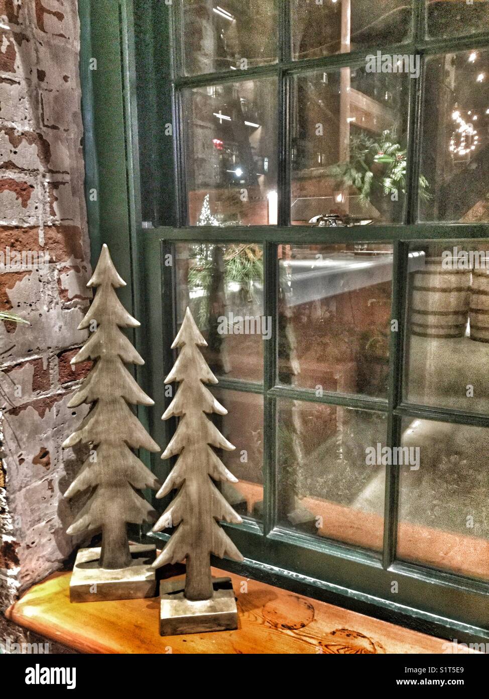 Wooden Christmas trees on a window sill Stock Photo Alamy