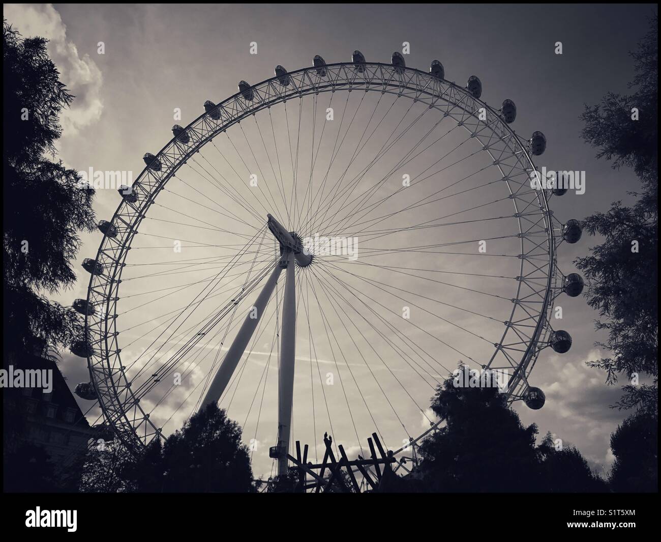 A view of the most popular tourist attraction in the U.K. - the London Eye or Millennium Wheel. This is Europe's largest Ferris Wheel with 32 rotating & viewing pods. Photo - © COLIN HOSKINS. - Smartphone Captured Stock Image