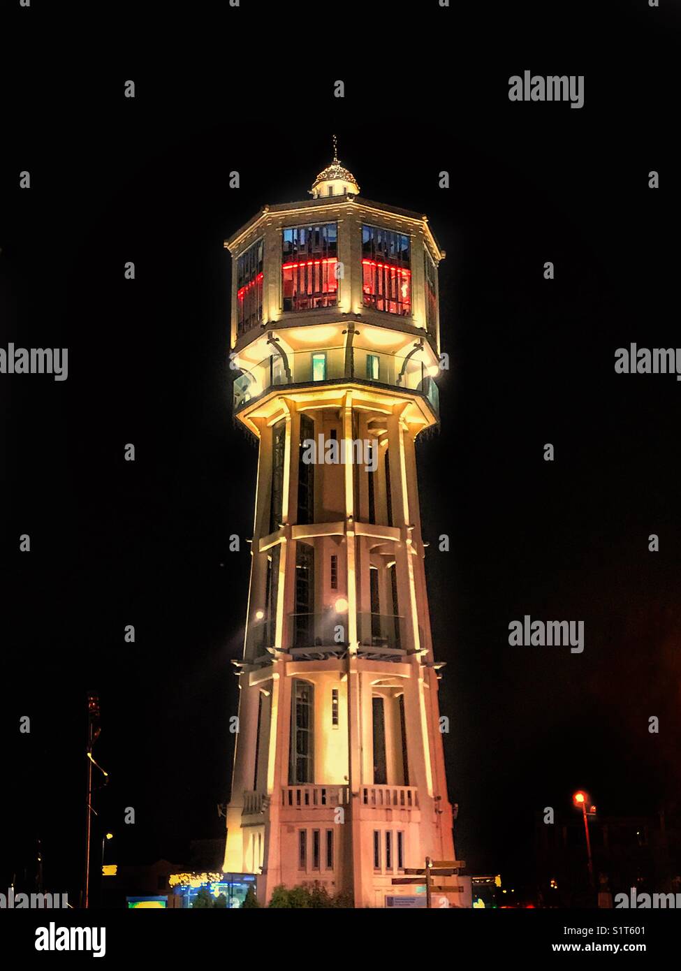 Watertower at night Stock Photo