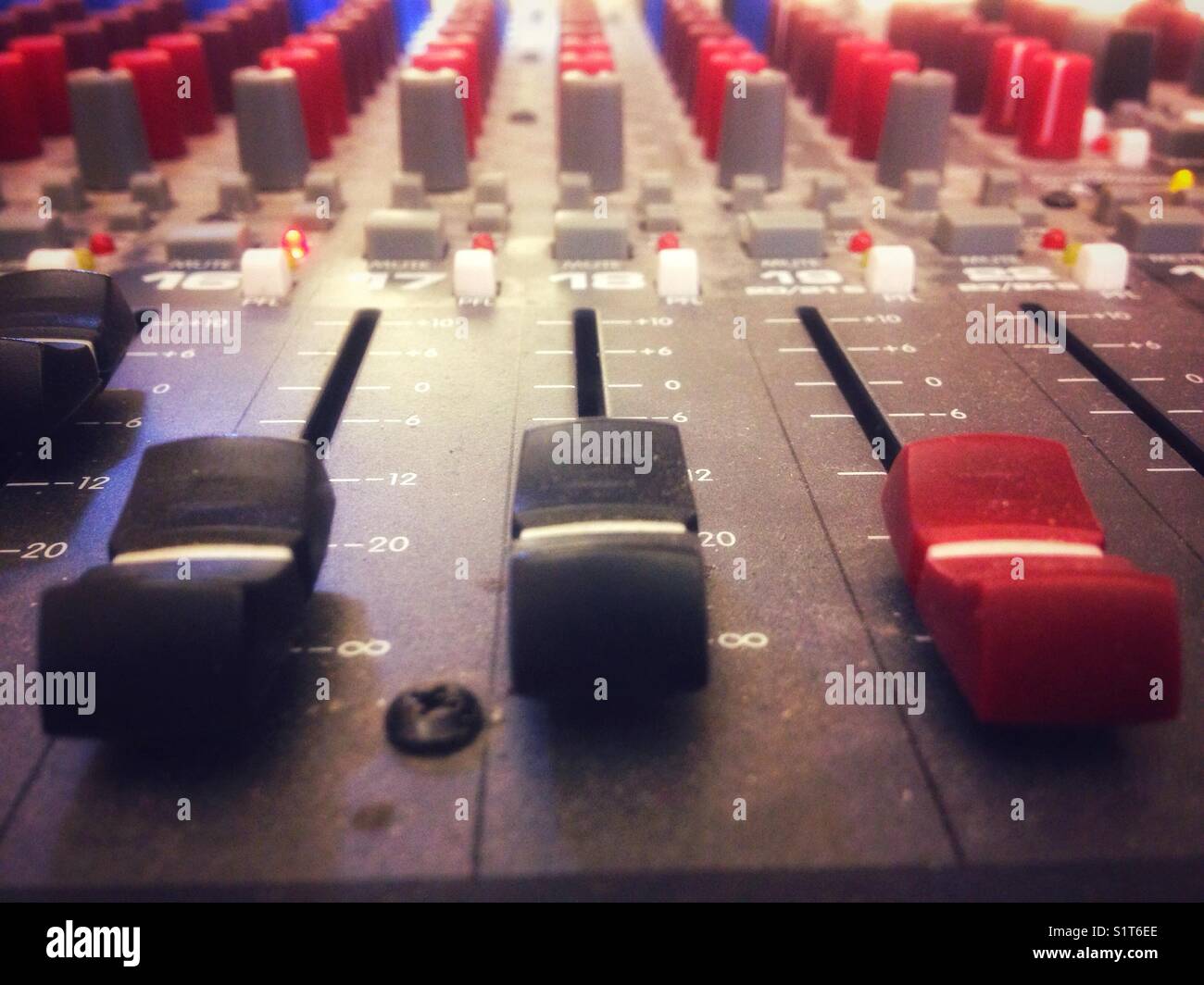 Sliders in a sound mixing desk. - Smartphone Captured Stock Image