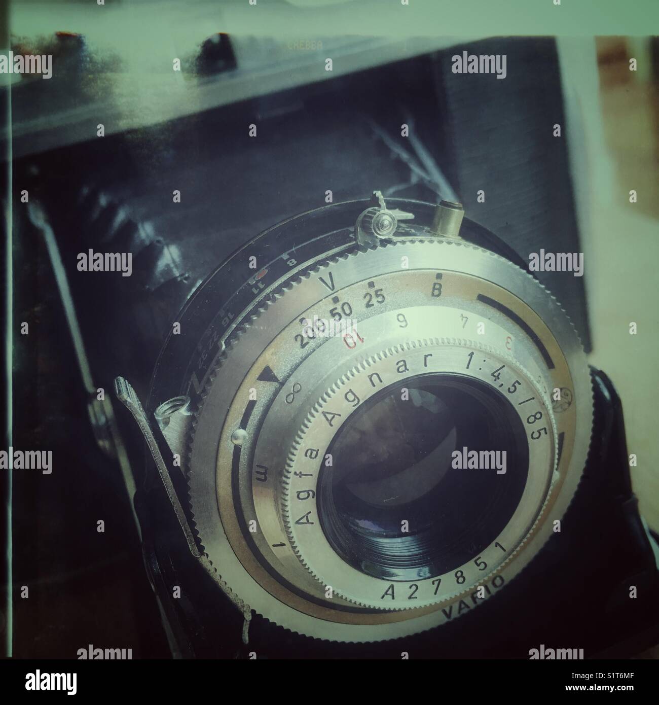 Close up of Agfa Isolette 1 compact horizontal folding camera. Manufactured in 1951-1958. It requires 120 film and gives 12 exposures of 6x6cm image. - Smartphone Captured Stock Image