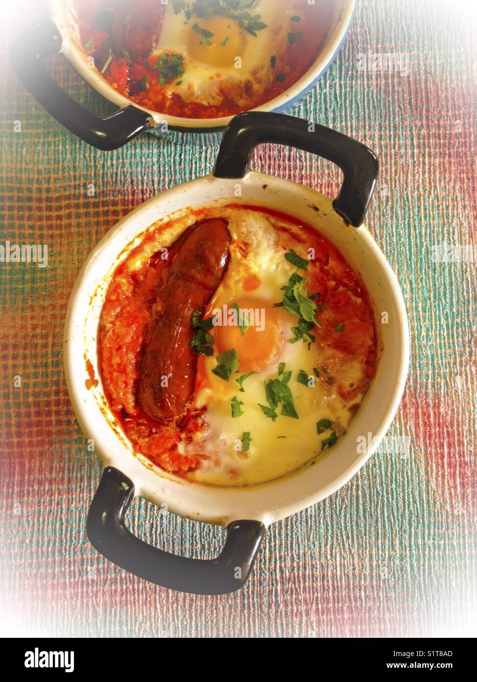 Baked chorizo and egg. Stock Photo