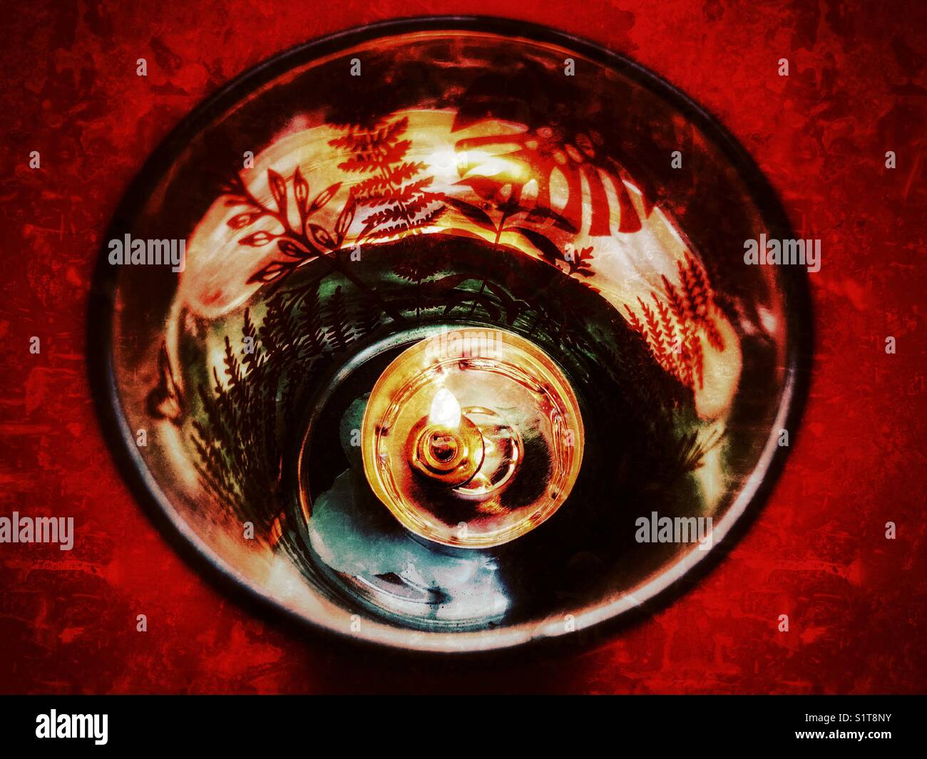 Candle in a glass, high angle view - Smartphone Captured Stock Image