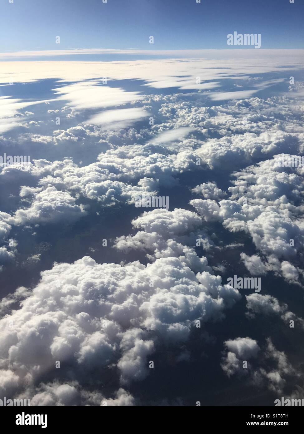 Clouds over Europe from 35000 feet - Smartphone Captured Stock Image