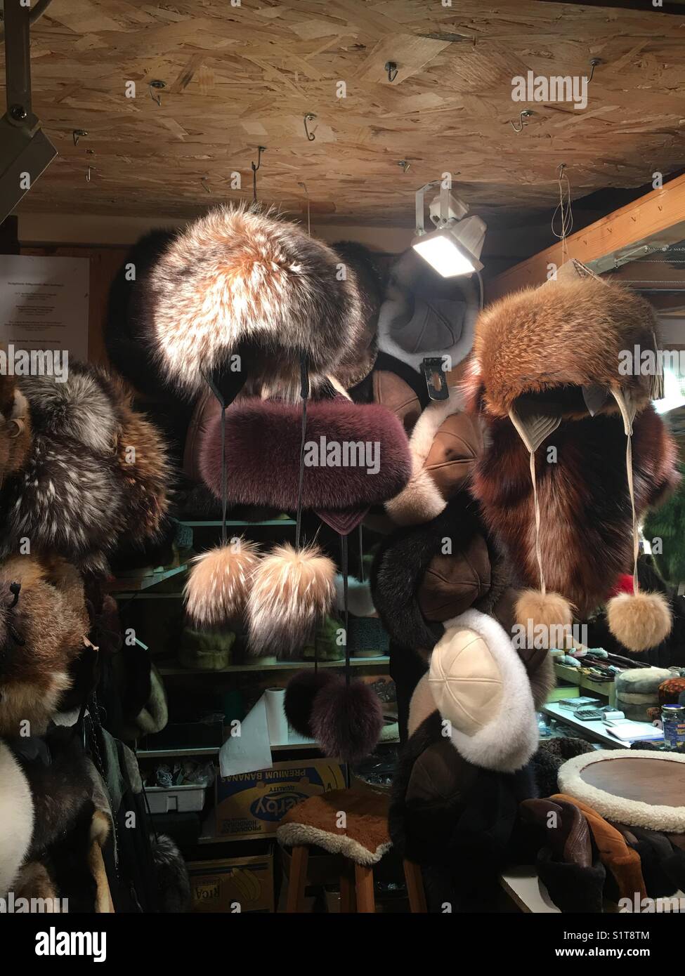 Fur products for sale Christmas Market Budapest Hungary - Smartphone Captured Stock Image