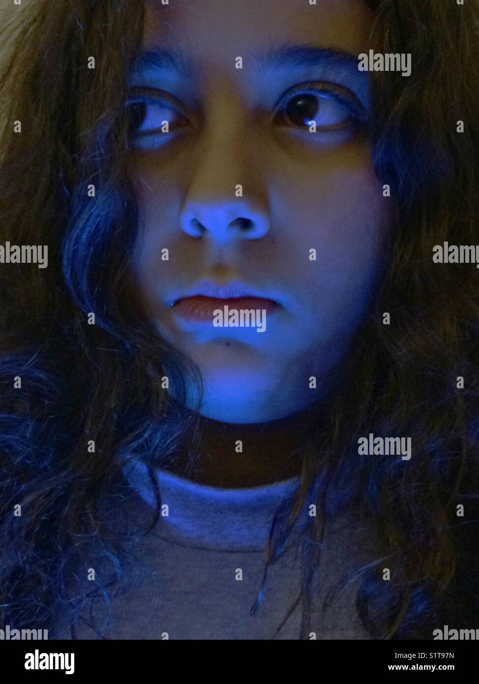 Portrait of young girl with blue tone Stock Photo - Alamy