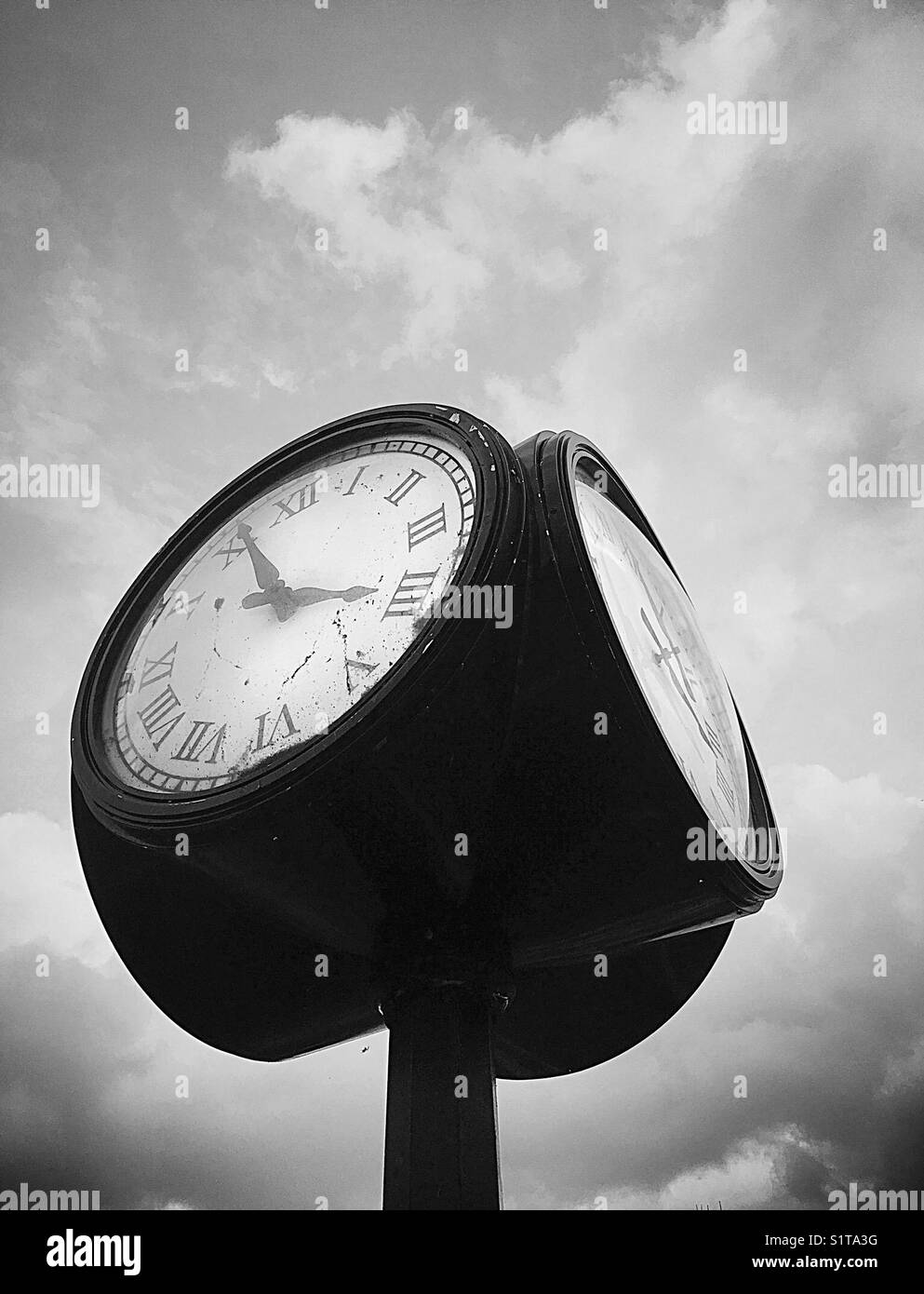 Four sided clock in black and white Stock Photo