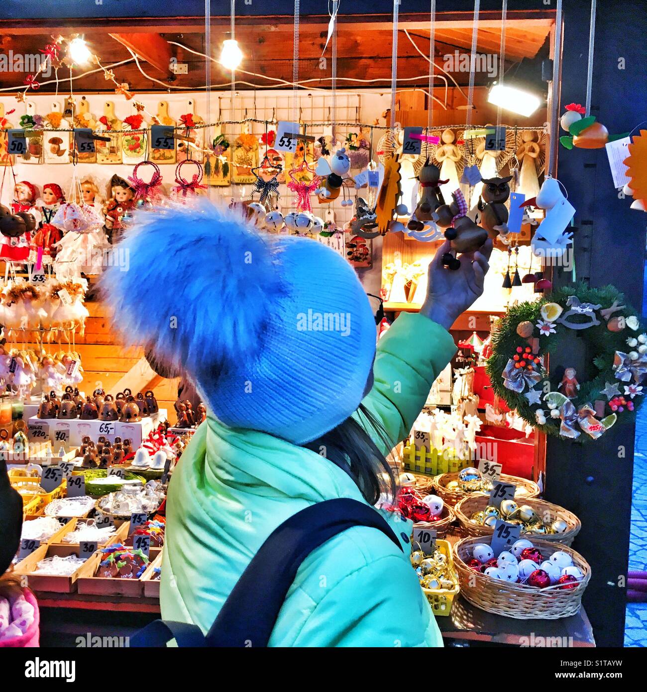 Woman at christmas market stand, Ceske Budejovice, Czech Republic - Smartphone Captured Stock Image