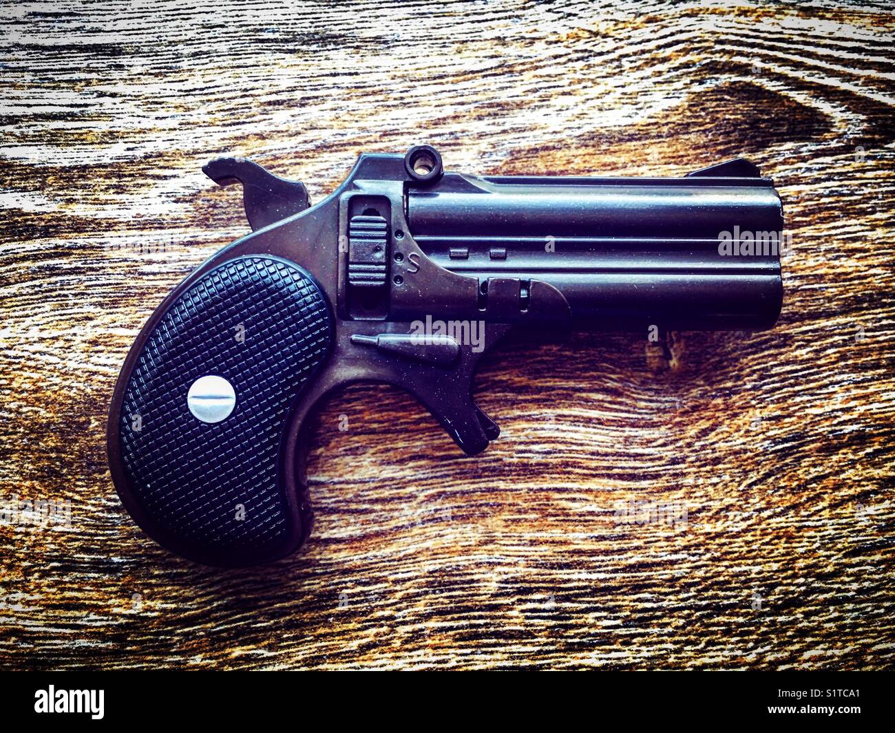 Plastic gun small  size - Smartphone Captured Stock Image