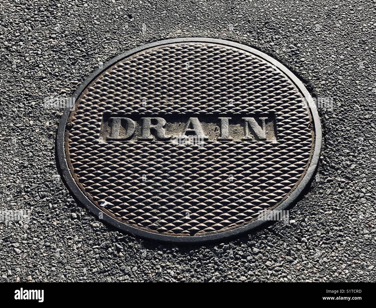 Steel drain cover Stock Photo - Alamy