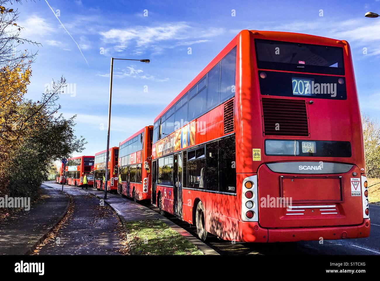 Red London buses parked up. Stock Photo