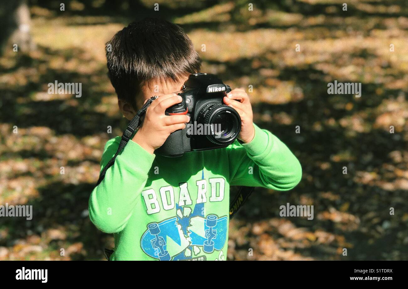 Child with a camera Stock Photo