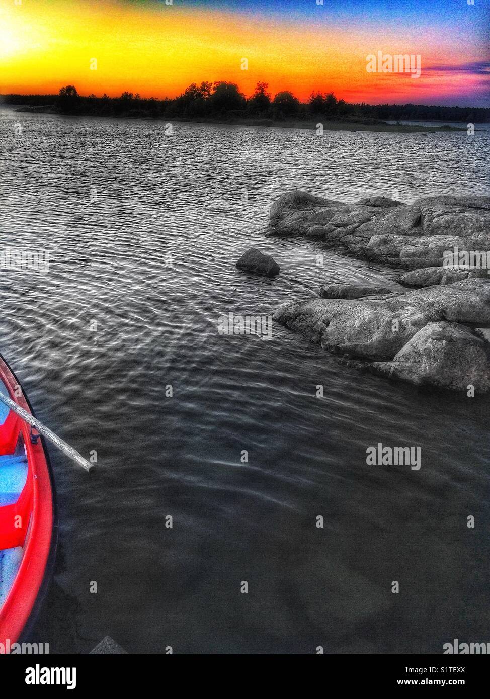 Rowing boat on the coast of Graso an island off the coast of Uppland province on Sweden’s east coast, Sweden, Scandinavia - Smartphone Captured Stock Image