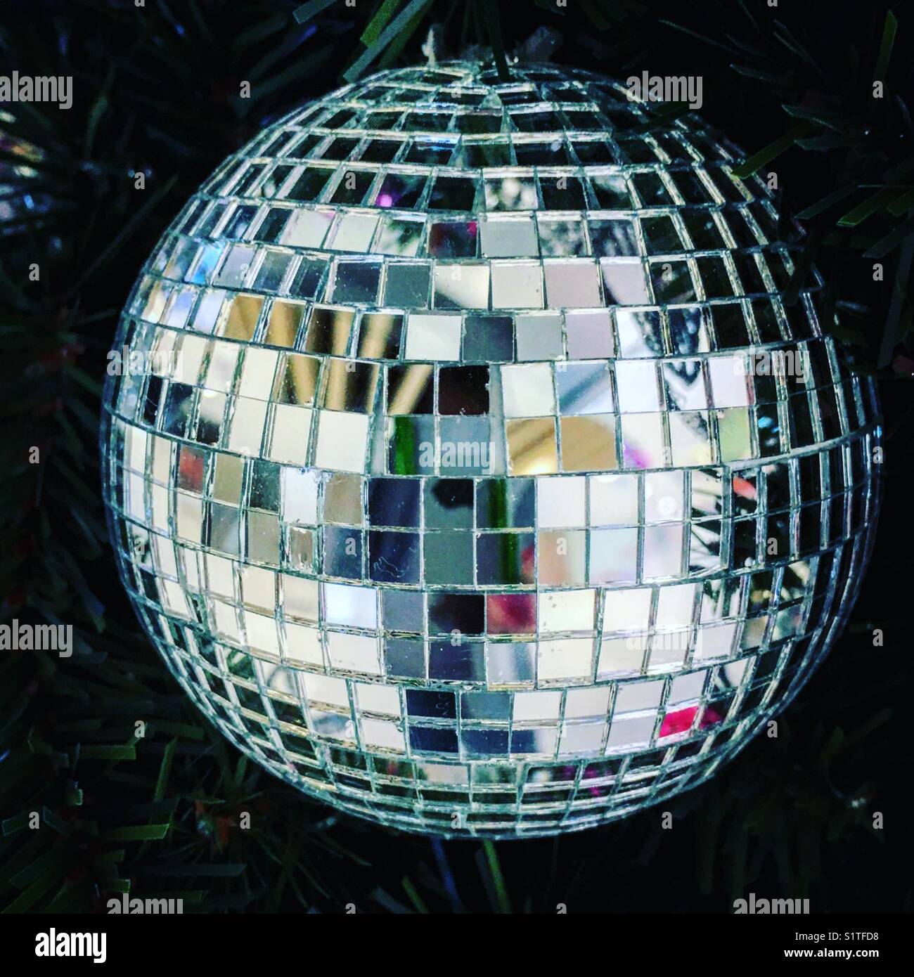 Disco ball on a christmas tree - Smartphone Captured Stock Image