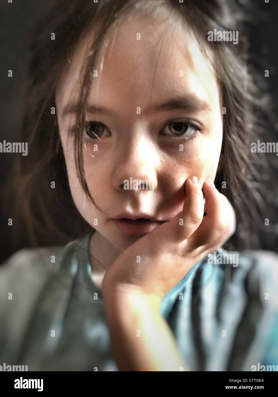 Serious looking girl - Smartphone Captured Stock Image