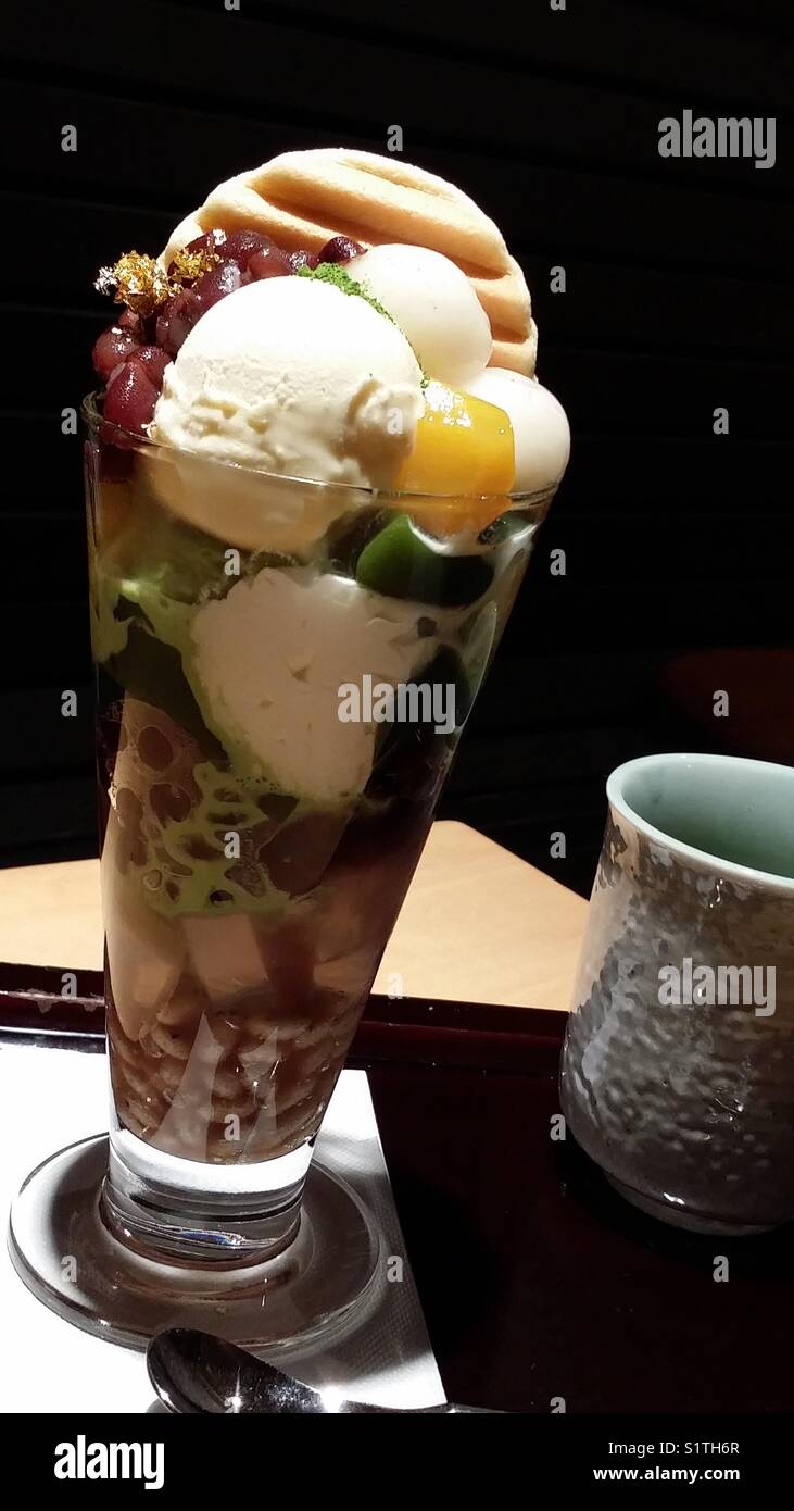 Mixed fruits parfait and green tea Stock Photo Alamy