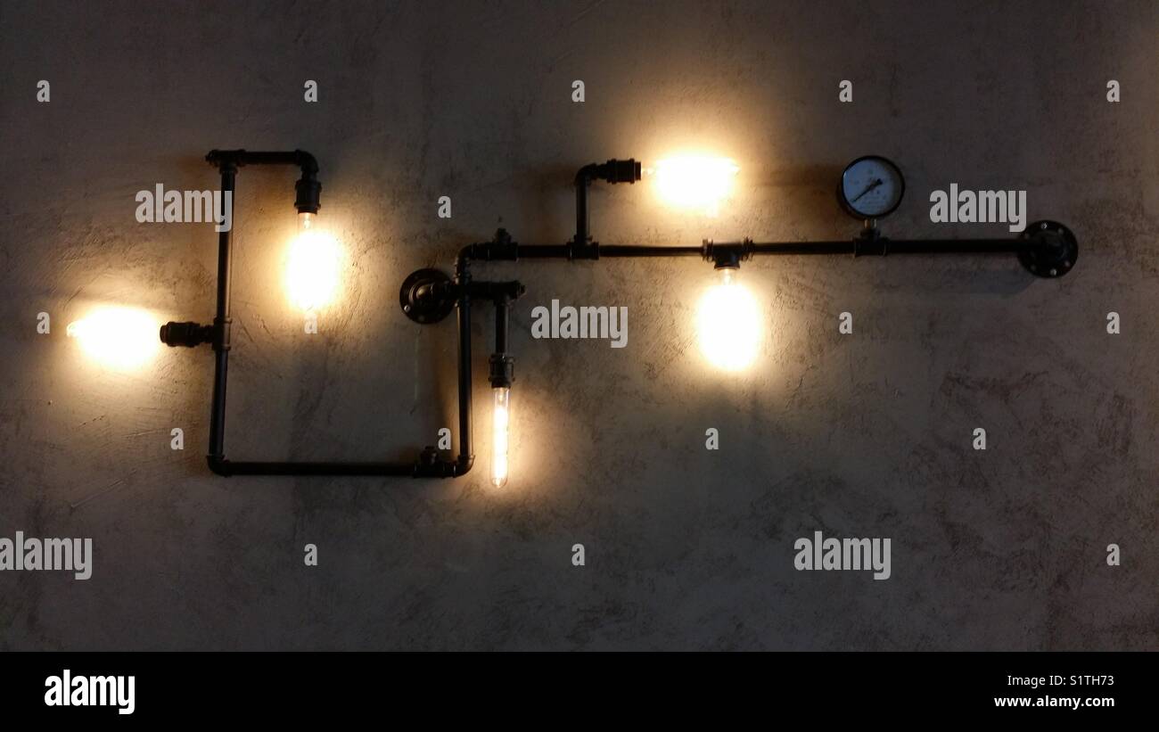 Industrial type lighting on a wall Stock Photo
