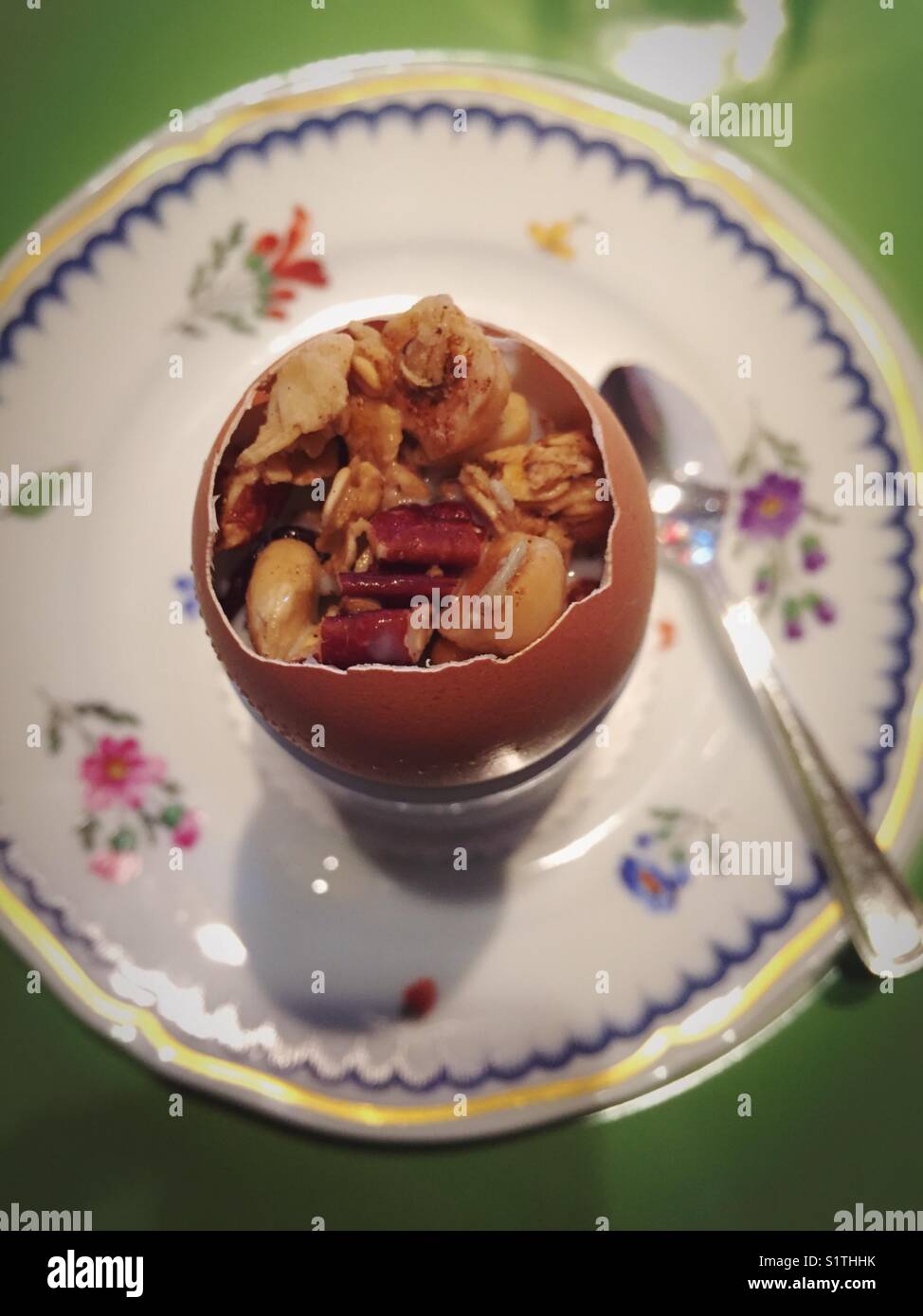 Fancy appetizer of special granola in an egg shell presentation at luxury upscale restaurant in New York City, USA - Smartphone Captured Stock Image