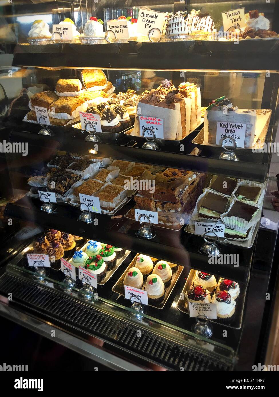 Vegan pastries in a display case at Valhalla Bakery in Orlando, Florida, USA. Stock Photo