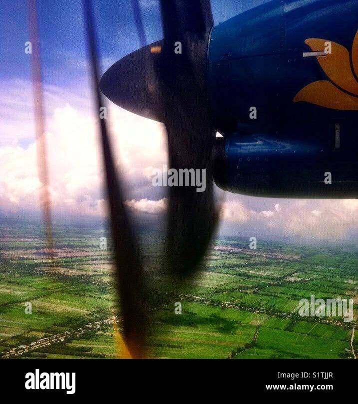 Propeller plane over Vietnam Stock Photo Alamy