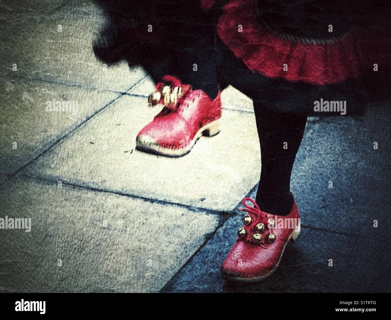Clog dancing, a traditional English folk dance, detail of legs & red