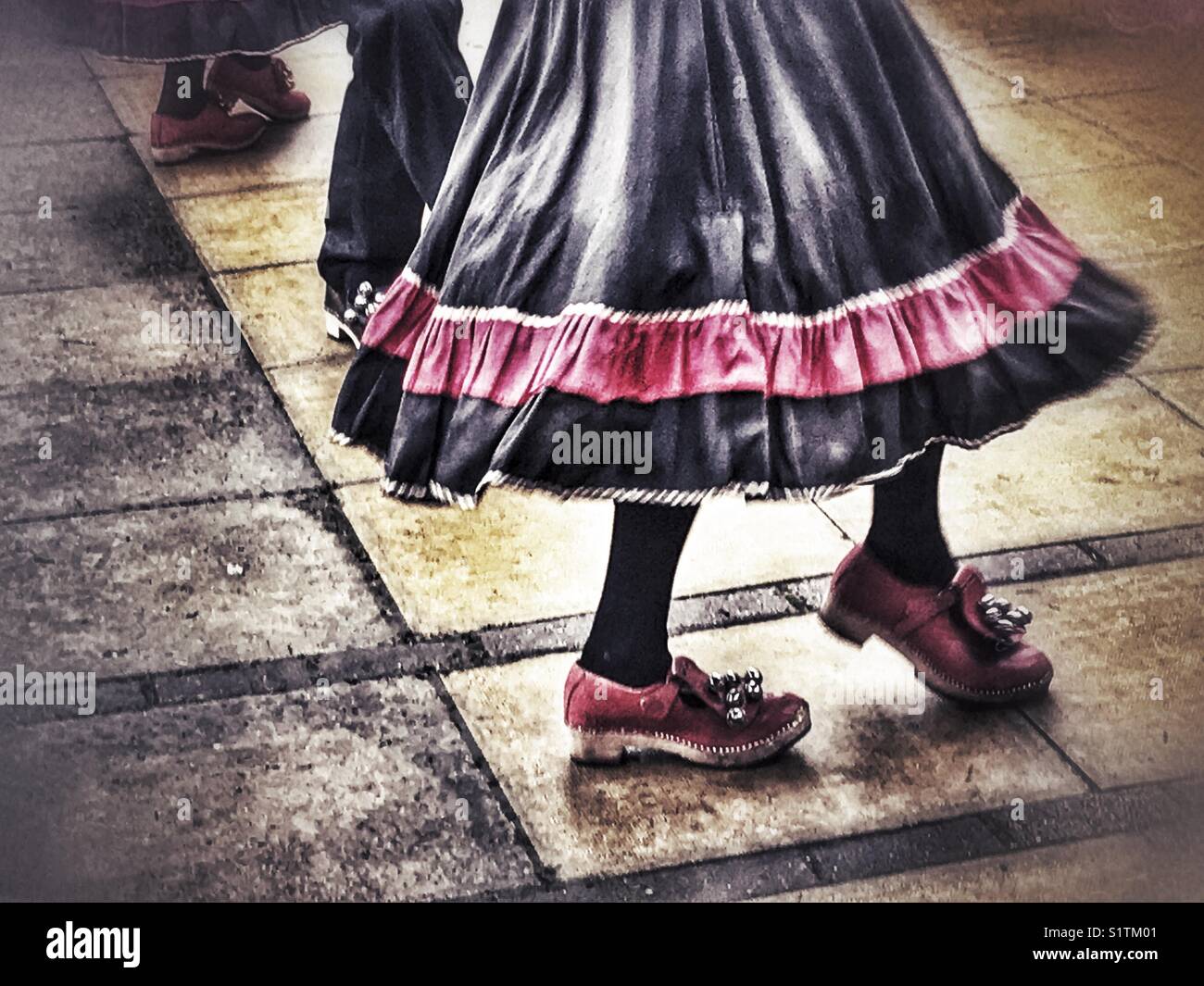 Clog dancing, a traditional English folk dance with bells on clogs