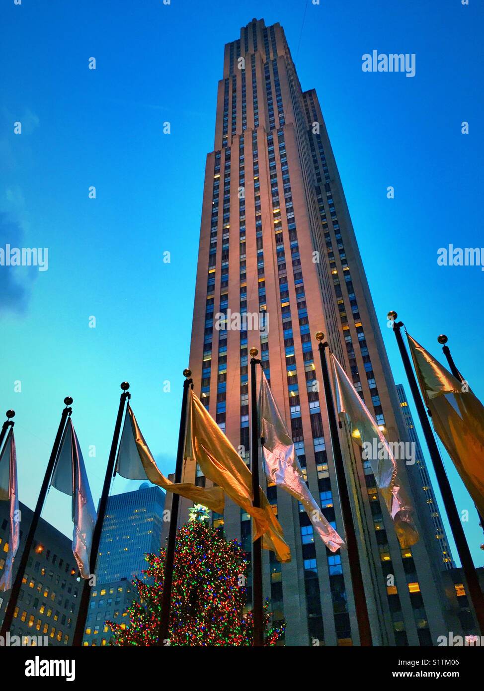 Flags at the plaza of Rockefeller Center, New York City, USA - Smartphone Captured Stock Image
