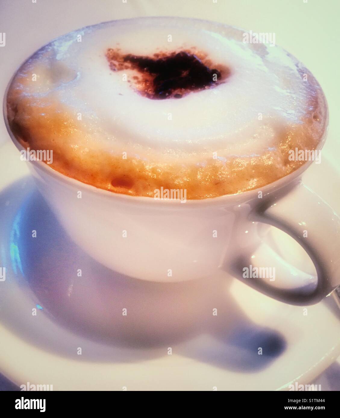 Still life of cappuccino coffee drink. - Smartphone Captured Stock Image