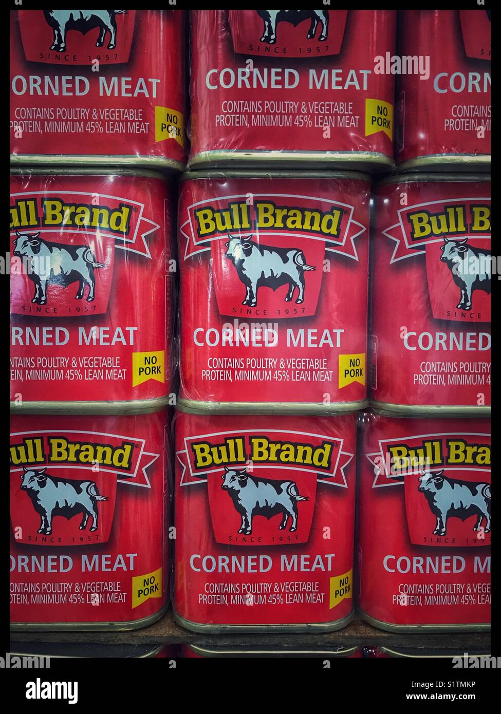 Stack of corned meat on supermarket shelf Stock Photo Alamy