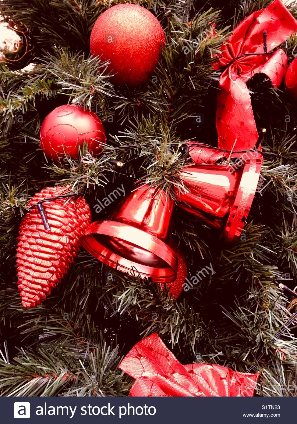 Close up of Christmas tree decorations in red Stock Image