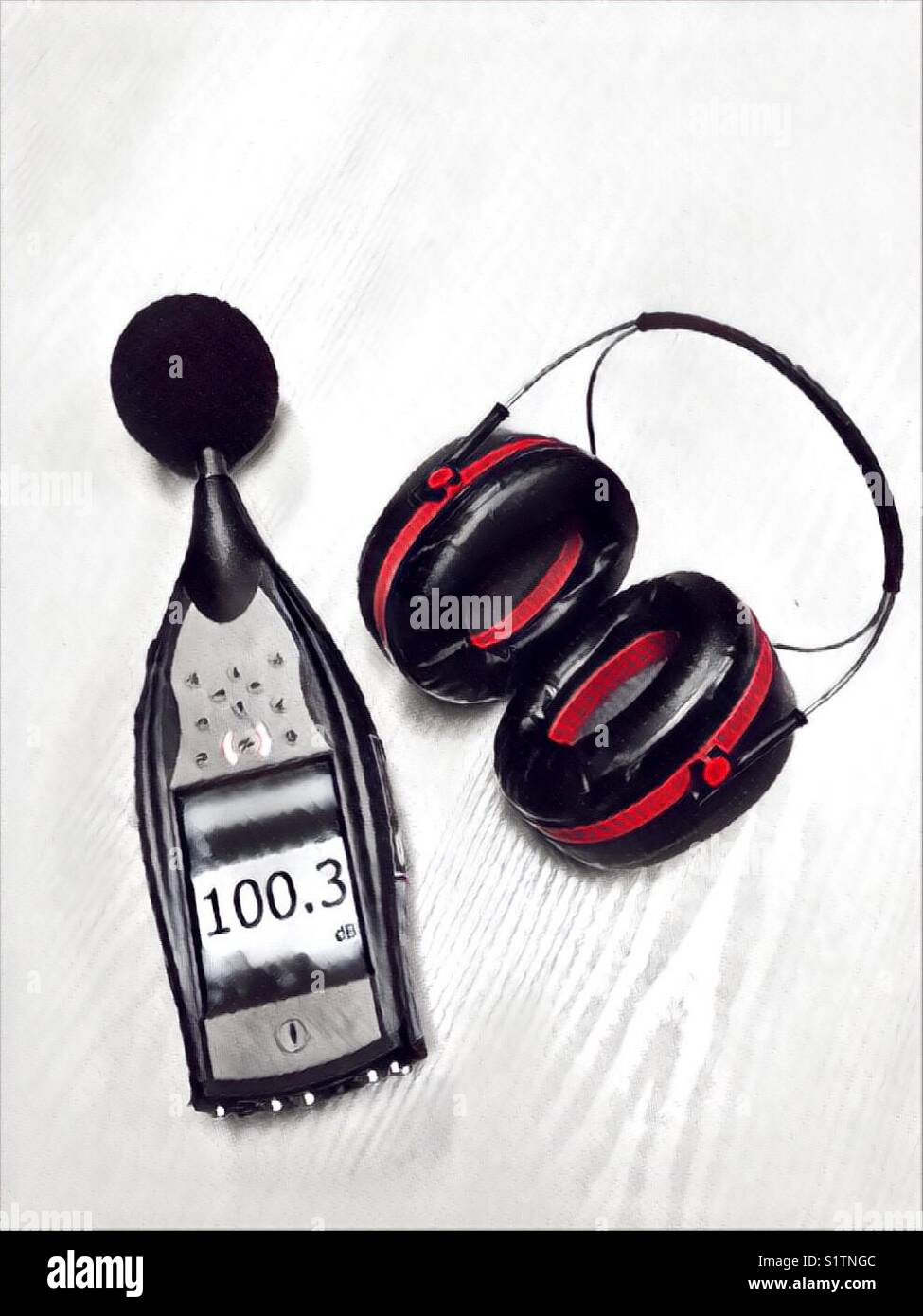 Noise level meter and hearing protection - Smartphone Captured Stock Image