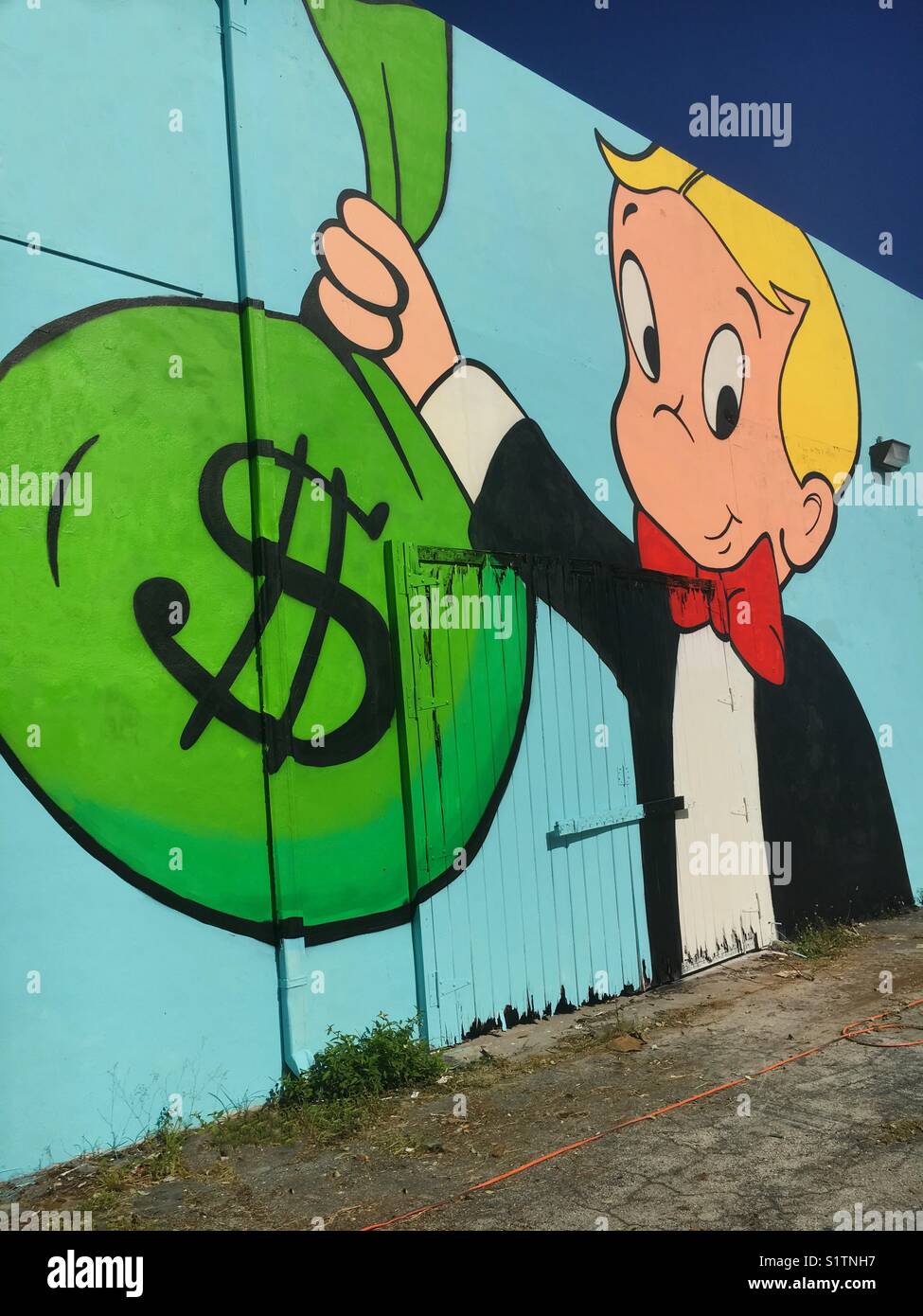 Richie rich cartoon hi-res stock photography and images - Alamy