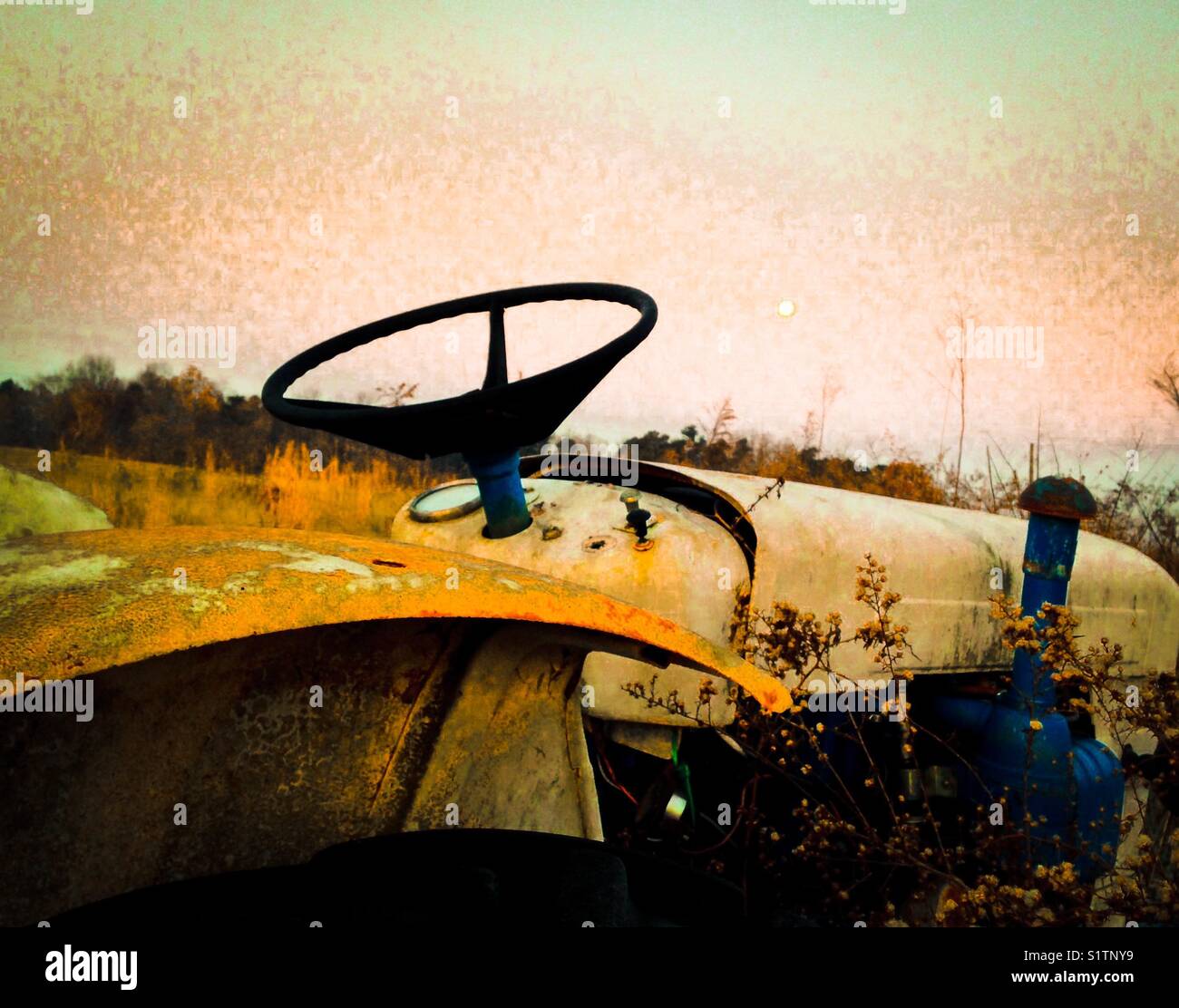Morning super moon and tractor - Smartphone Captured Stock Image