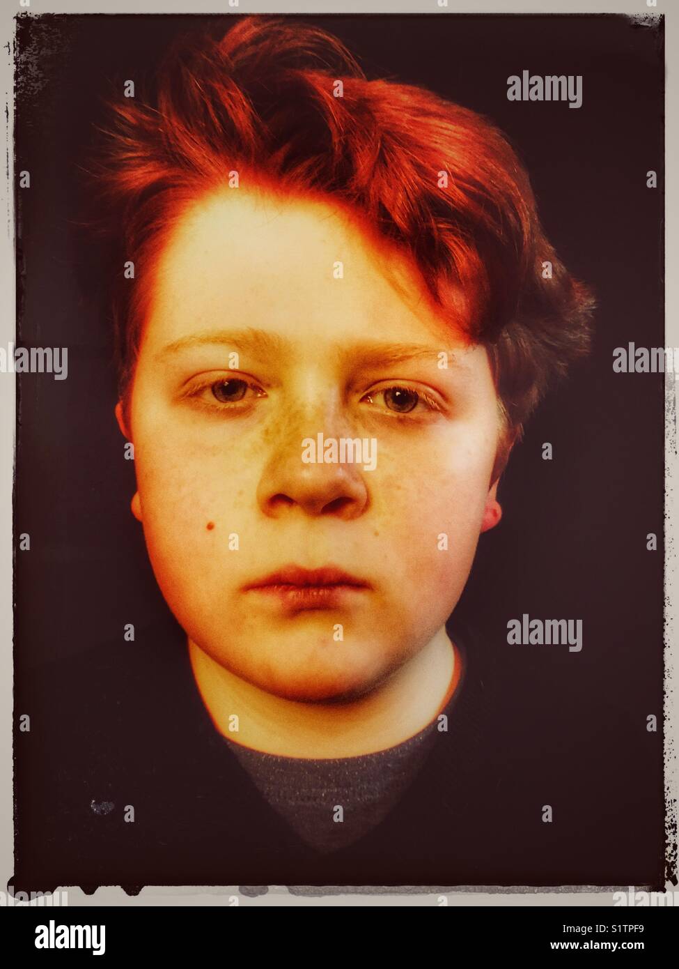 Ginger haired boy - Smartphone Captured Stock Image