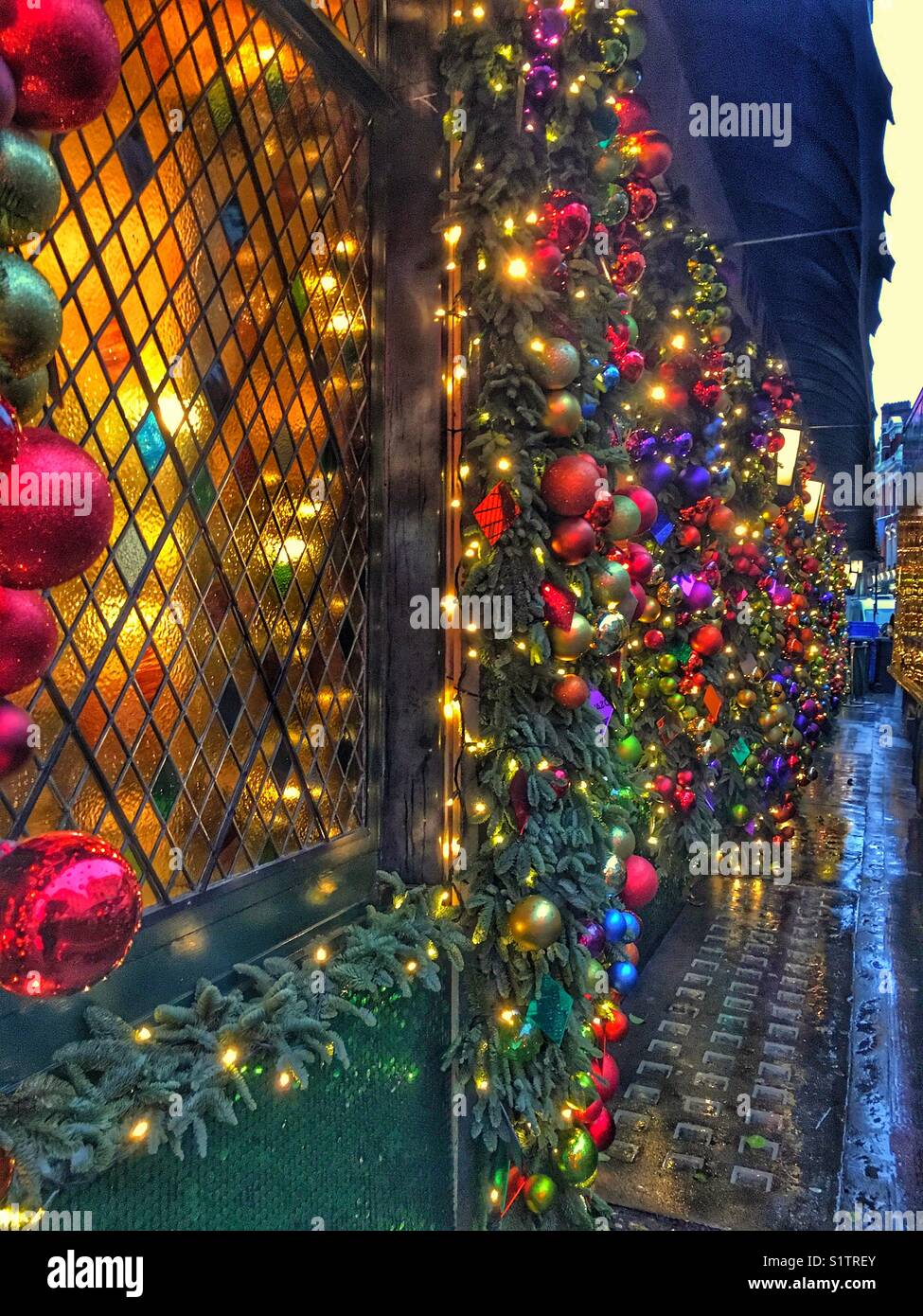 Christmas decorations outside The Ivy in london Stock Photo