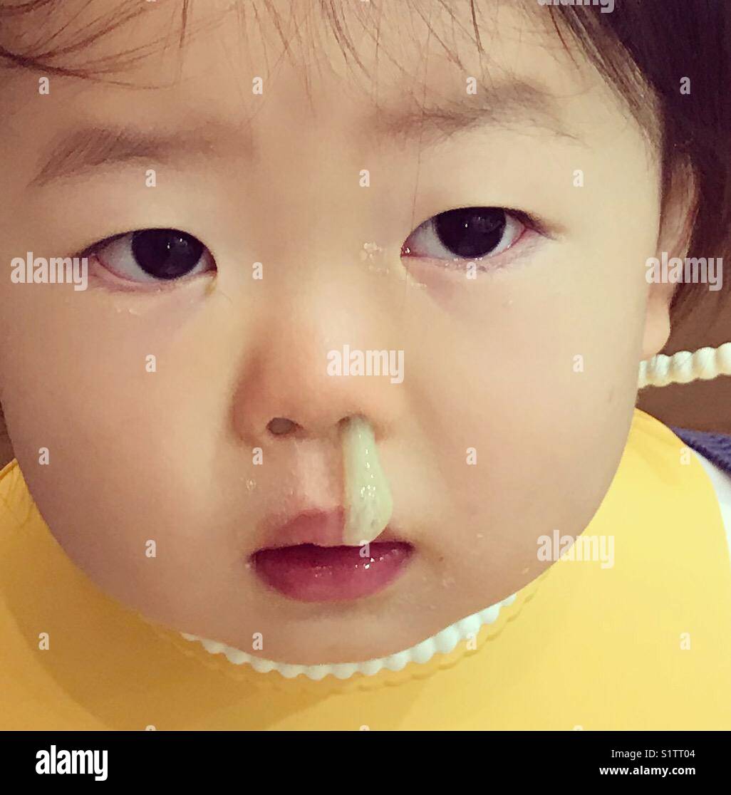 a japanese baby with green snot Stock Photo