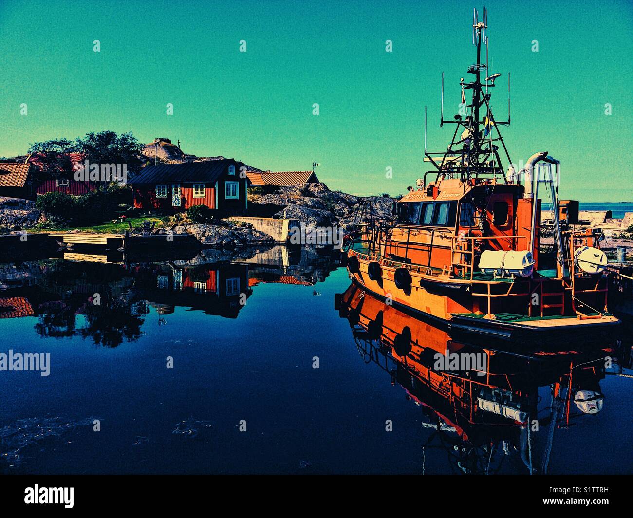 Pilot boat in Vasterhamn (west harbour) on the island of Oja at the southern end of the Stockholm archipelago, Sweden, Scandinavia - Smartphone Captured Stock Image